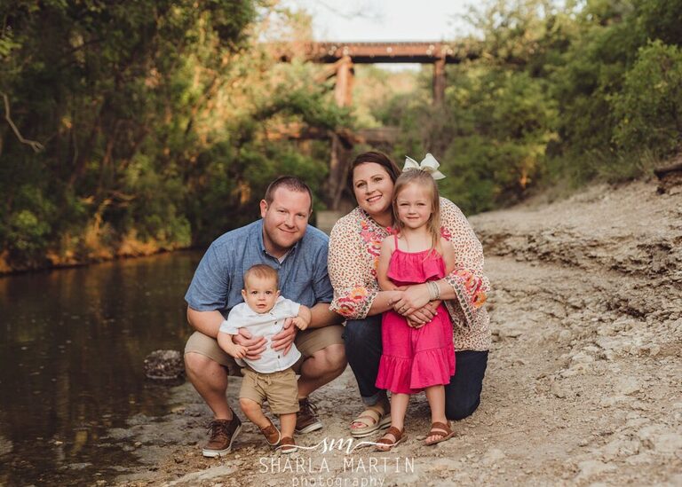 family photo with one year boy photo session near creek