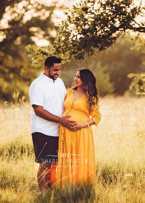 maternity couple in field photography near me